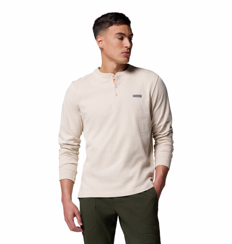 a man wearing a brown landroamer long sleeve henley