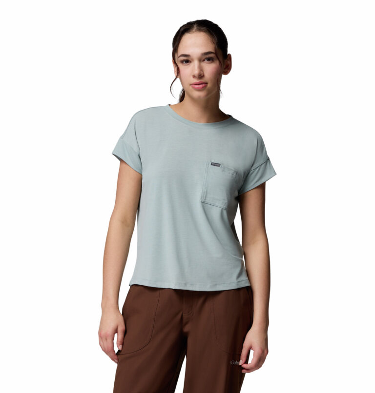 a women wearing a blue Daniela Falls Short Sleeve Tee