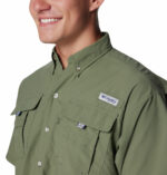 a man wearing a brown Bahama II Short Sleeve Shirt