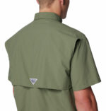 a man wearing a brown Bahama II Short Sleeve Shirt