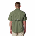 a man wearing a brown Bahama II Short Sleeve Shirt