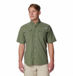 a man wearing a brown Bahama II Short Sleeve Shirt