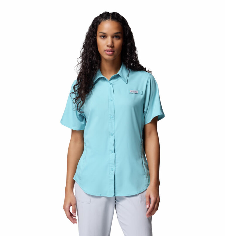 a women wearing a blue Tamiami II Short Sleeve Shirt