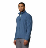 a man wearing a blue Fast Trek II Full Zip Fleece
