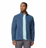 a man wearing a blue Fast Trek II Full Zip Fleece