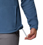 a man wearing a blue Fast Trek II Full Zip Fleece