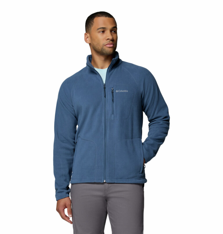 a man wearing a blue Fast Trek II Full Zip Fleece