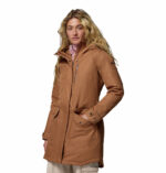 a women wearing a brown Suttle Mountain Long Insulated Jacket