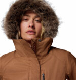 a women wearing a brown Suttle Mountain Long Insulated Jacket