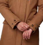 a women wearing a brown Suttle Mountain Long Insulated Jacket
