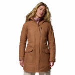 a women wearing a brown Suttle Mountain Long Insulated Jacket