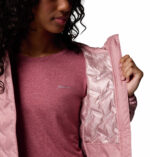 a women wearing a pink Delta Ridge II Down Hooded Jacket