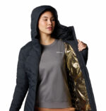 a women wearing a black Joy Peak II Mid Hooded Jacket