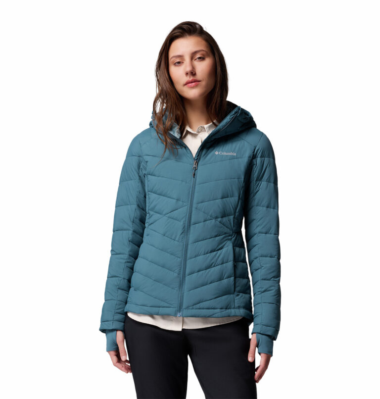 a women wearing a blue Joy Peak II Hooded Jacket