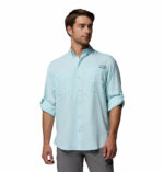a man wearing a blue PFG Tamiami Long Sleeve Shirt
