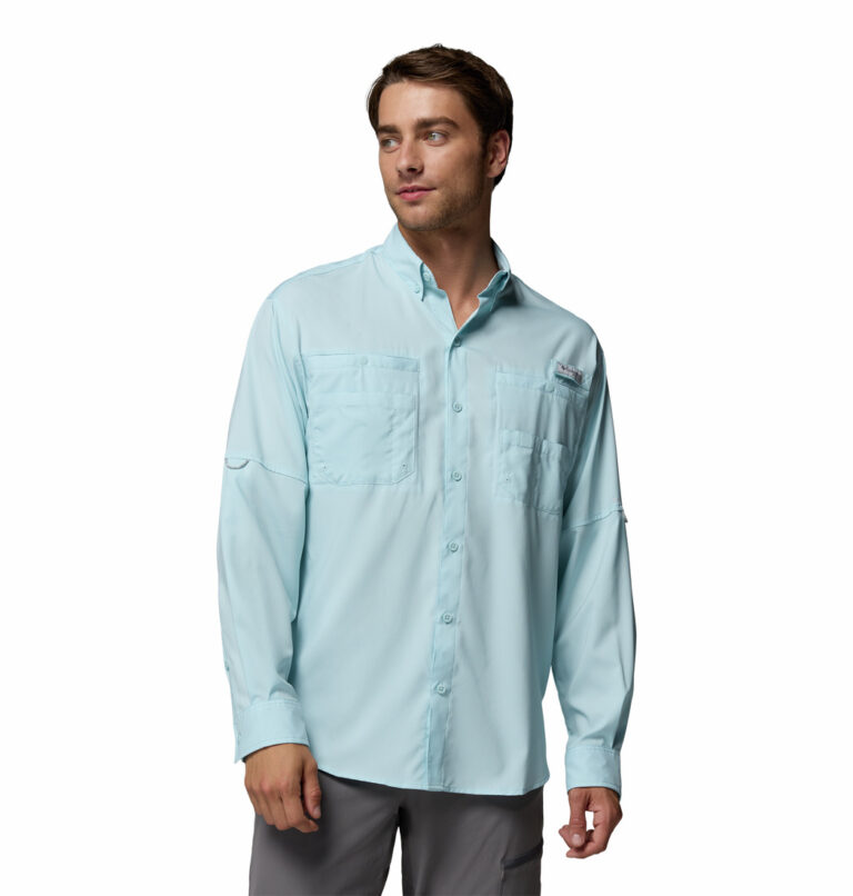 a man wearing a blue PFG Tamiami Long Sleeve Shirt