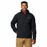 a man wearing a black Ascender Softshell Jacket