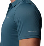 a man wearing a blue Columbia Hike Polo Shirt