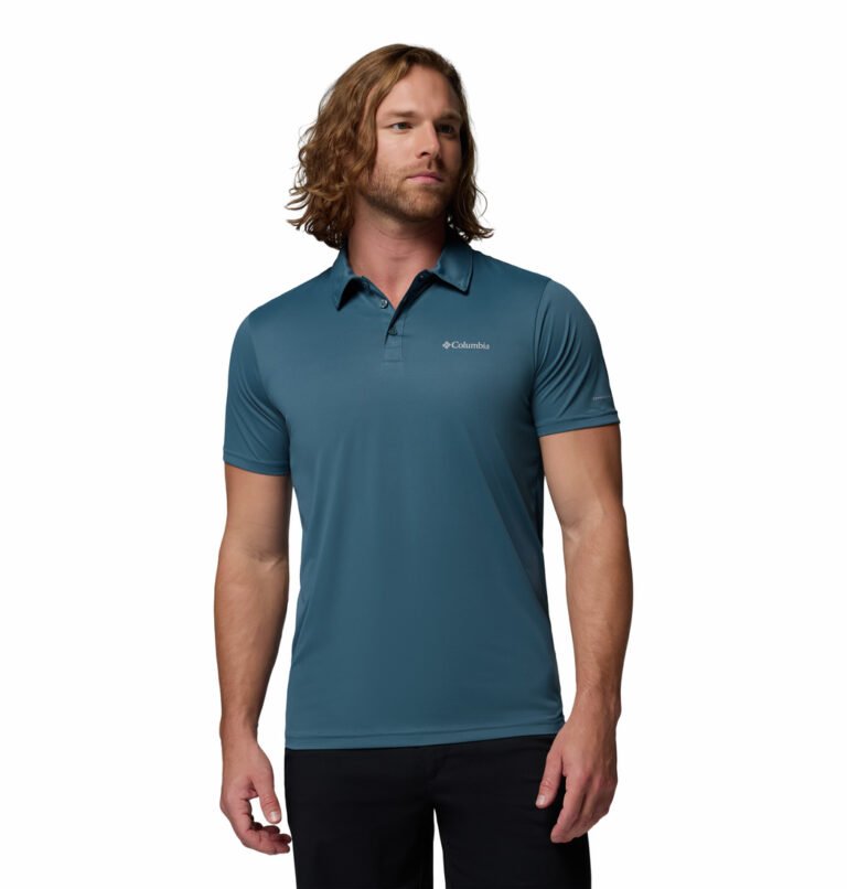 a man wearing a blue Columbia Hike Polo Shirt