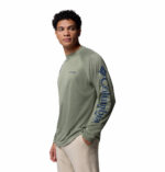 a man wearing a PFG Terminal Tackle Long Sleeve Shirt
