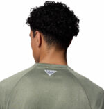 a man wearing a PFG Terminal Tackle Long Sleeve Shirt