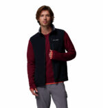 a man wearing a black Fast Trek Fleece Vest