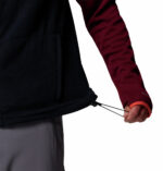 a man wearing a black Fast Trek Fleece Vest