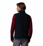 a man wearing a black Fast Trek Fleece Vest
