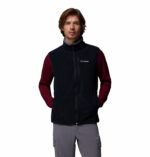a man wearing a black Fast Trek Fleece Vest