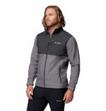 a man wearing a grey Ascender Softshell Jacket