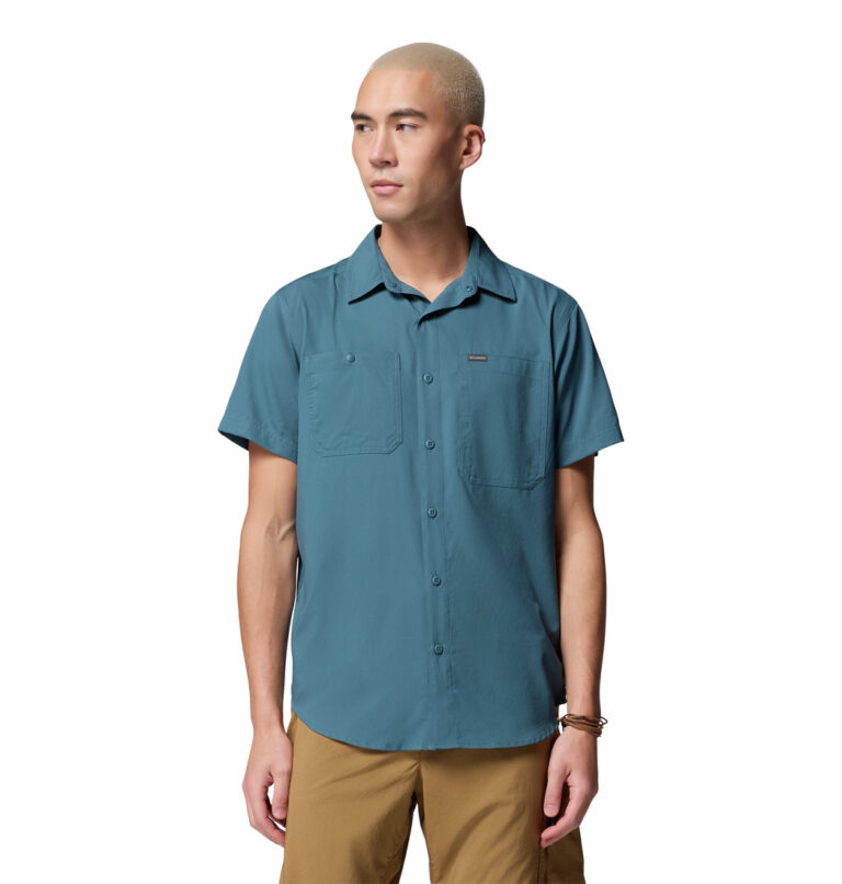 a man wearing a blue Silver Ridge Utility Lite Short Sleeve Shirt