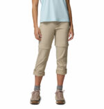 a women wearing a brown Leslie Falls Convertible Pants