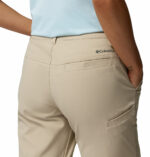 a women wearing a brown Leslie Falls Convertible Pants