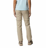 a women wearing a brown Leslie Falls Convertible Pants