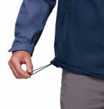 a man wearing a blue Hikebound II Jacket