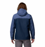 a man wearing a blue Hikebound II Jacket