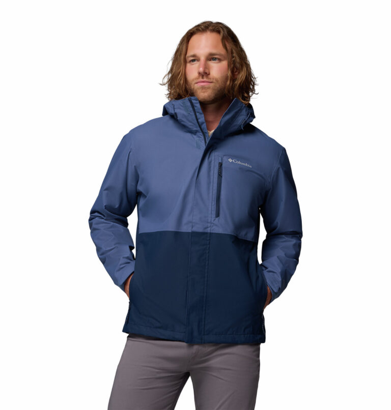 a man wearing a blue Hikebound II Jacket