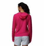a women wearing a pink PFG Tidal Tee II Hoodie