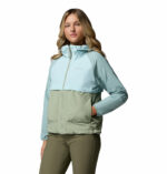 a women wearing a blue brown Spire Valley Windbreaker