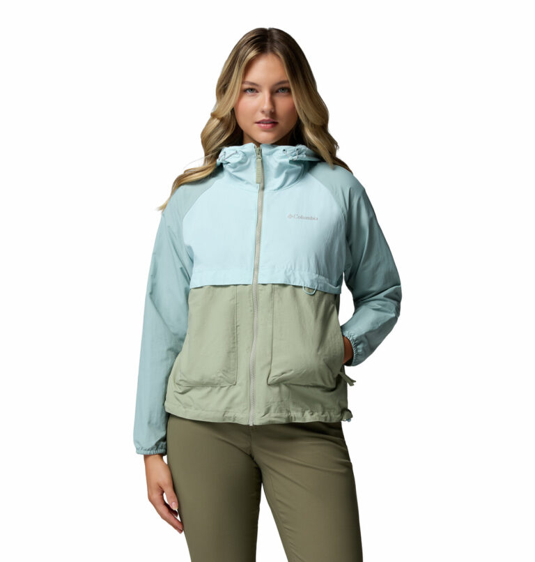 a women wearing a blue brown Spire Valley Windbreaker