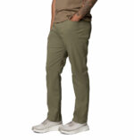 a man wearing green ROC 5 Pocket Pants