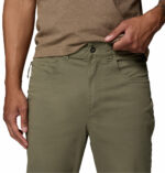 a man wearing green ROC 5 Pocket Pants