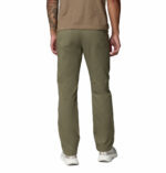 a man wearing green ROC 5 Pocket Pants