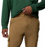 a man wearing brown ROC Tech Cargo Pants