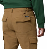 a man wearing brown ROC Tech Cargo Pants