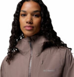 a women wearing a grey Trailborne 2.5L Shell Jacket