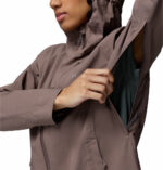 a women wearing a grey Trailborne 2.5L Shell Jacket