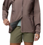 a women wearing a grey Trailborne 2.5L Shell Jacket
