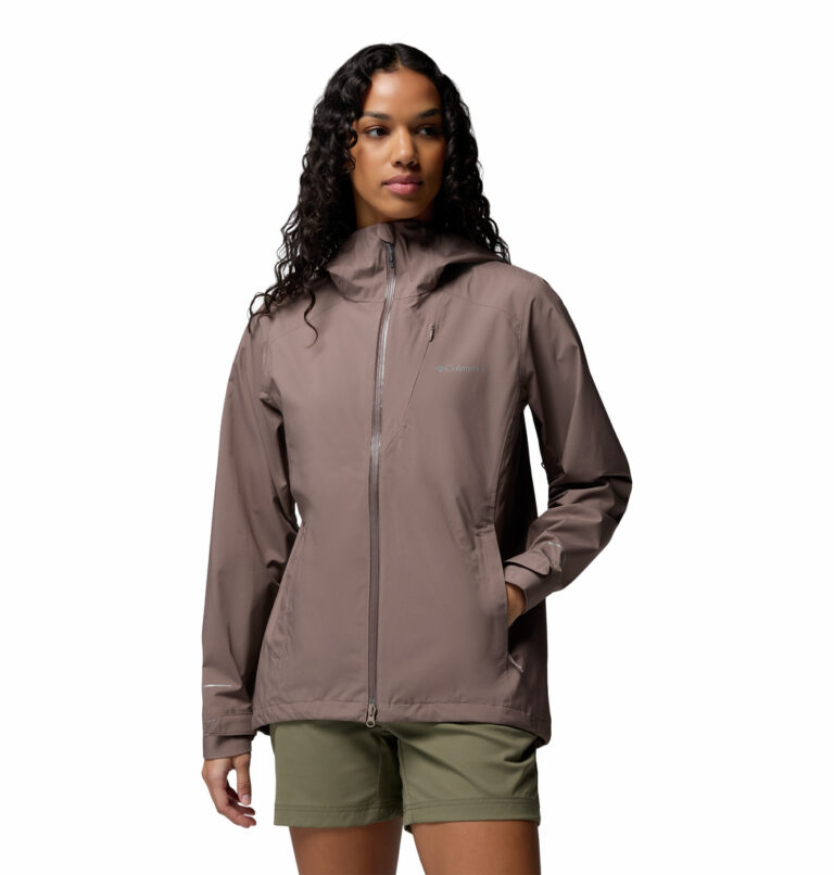 a women wearing a grey Trailborne 2.5L Shell Jacket