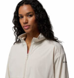 a women wearing a beige Amazestretch Jacket